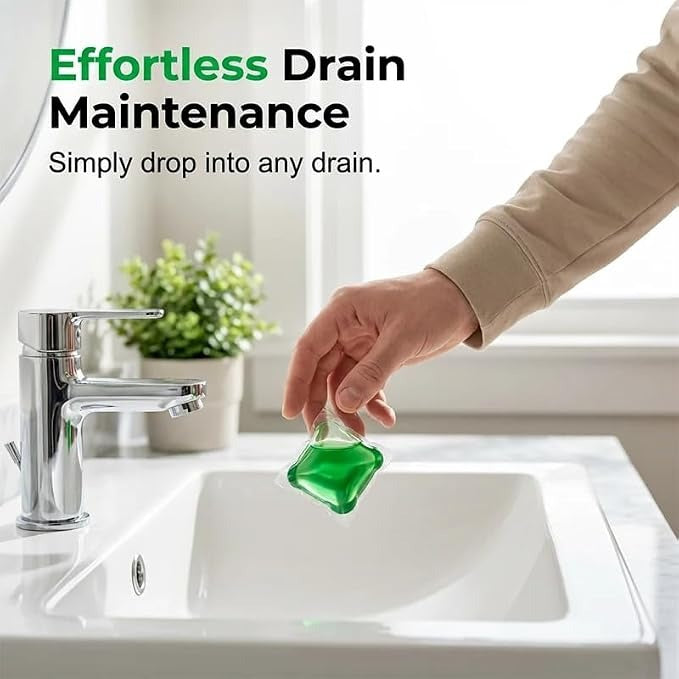 Water-soluble drain pod being dropped into a sink